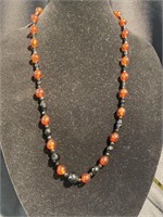 Amber and jet beaded necklace 15 inch drop