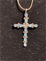 Opal cross mounted in sterling silver