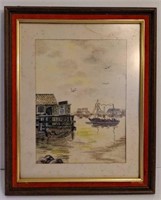 Framed seaside painting signed by artist in