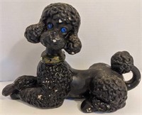 Vintage Chalkware poodle. Measures 12" long and