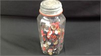 Old jar full of vintage buttons