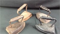 Lot of four cast-iron irons