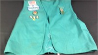 Girl Scout uniform top with patches