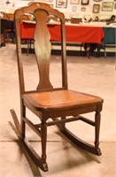 Lot #2904 - Antique cane bottom rocking chair