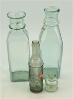Lot #2985 - (4) Antique glass bottle including