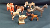 Lot of 8 wooden horses 2 inch to 5 inch