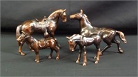 Lot of four heavy bronze horses 4 inch to 6 inch