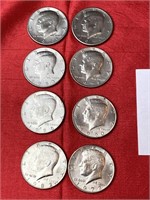 8 Kennedy half dollars