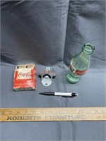 Coke bottle and opener