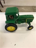 John Deere tractor/ Donald Duck tin caster toy