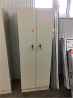Two door steel cabinet 24 inches wide 15inches