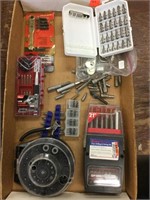 New and used drill bits and sets of bits and