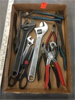 Adjustable wrenches and pliers and channel locks,