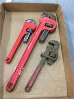 Three pipe wrenches