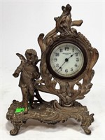 Brass New Haven Cupid Clock, Art Nouveau case,