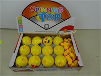 Display of 12 Emoji Spinning Tops