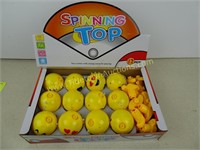 Display of 12 Emoji Spinning Tops