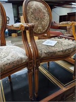 pair of open arm chairs