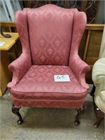 upholstered arm chair in red/pink