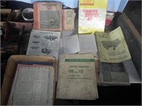 box of misc older equipment manuals to include