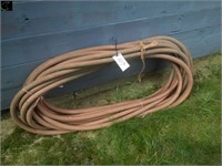 large roll of fuel hose