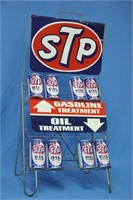 Vintage STP metal store display rack w/ (8) cans