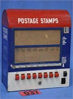 Vintage coin-op metal stamp dispenser