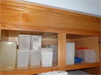 Plastic ware, contents of cabinet over frig.