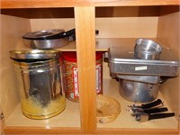 Skillets, tins, cake pans, etc.  contents of