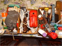 Ext. cords, tools, gloves, caulk, flash light,