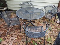 iron patio table with four chairs