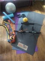 lot of assorted workout equipment