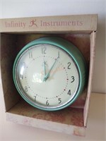Infinity Instruments teal metal wall hanging clock