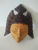 Wood carved Egyptian wall hanging face.