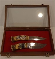 Buck knife with hand carved horn handle.  Bidding