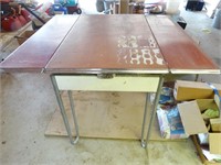 Vintage metal table (shows wear)