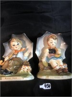 2 “Rainy days “ boy and girl figurines. Made in