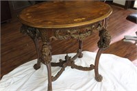Heavily Carved Antique Table with Inlaid top