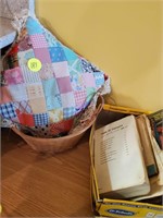 PILLOW AND BASKET OF BOOKS