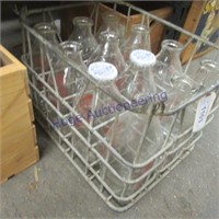 Wire milk crate w/ 12 qt bottles
