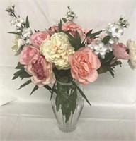 Lead crystal vase with floral arrangement. Vase