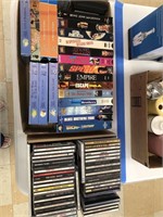 Assorted VHS Tapes and CD's