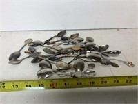 Small, silver tone spoon collection
