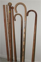 One lot of canes and yarsticks (some advertising)