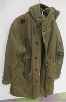 Size medium military coat with hood.