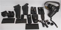 Assortment of leather police issued gun holsters