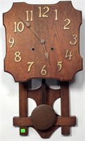 Oak Arts & Crafts Wag on Wall Clock, split