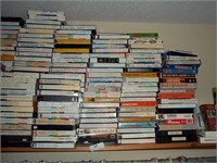 Contents of Shelf- Lots of VHS Tapes