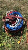Multiple extension cords, trouble lights, air hose