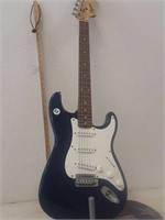 Squire start  electric guitar with stand